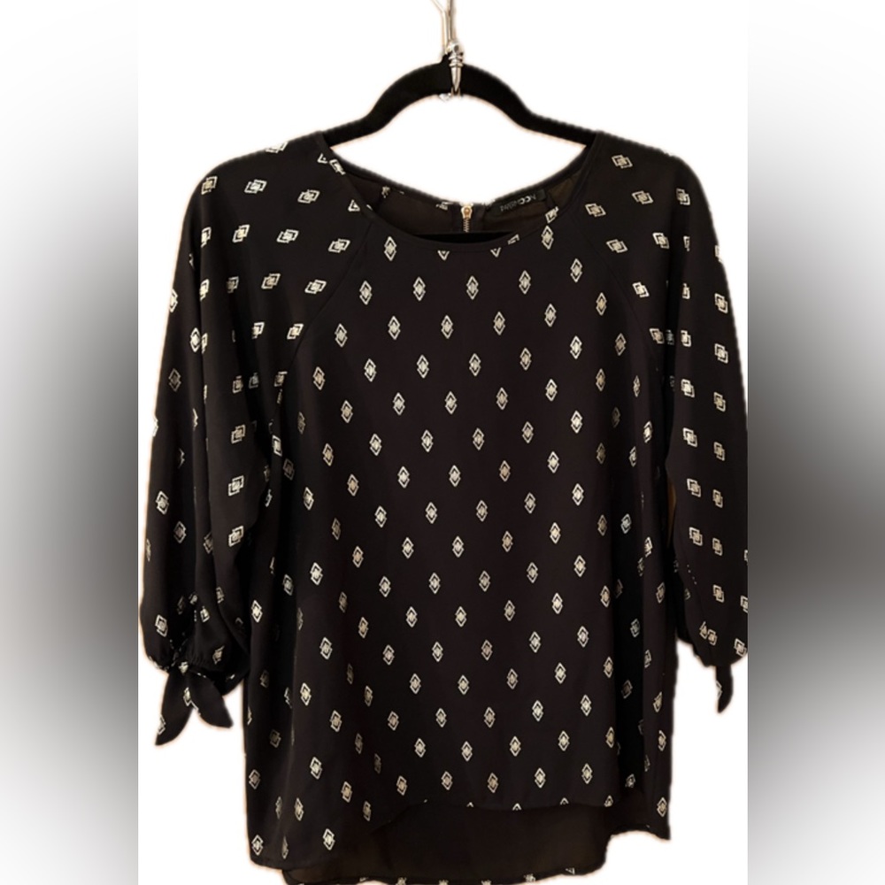 Black blouse with gold accent